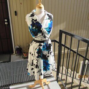 #753  NEW WOMAN'S FLORAL PRINT DRESS BY S.L. FASHIONS  (SIZE 14)